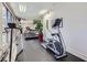 Bright gym featuring an elliptical and a treadmill, perfect for a complete workout at 1280 W Peachtree Nw St # 3414, Atlanta, GA 30309