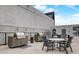 Outdoor kitchen area with grills and seating, ideal for entertaining and enjoying outdoor meals at 1280 W Peachtree Nw St # 3414, Atlanta, GA 30309