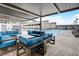 Relaxing outdoor lounge area with comfortable blue seating and a refreshing swimming pool at 1280 W Peachtree Nw St # 3414, Atlanta, GA 30309