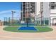 Community rooftop tennis and basketball court with views of the cityscape at 1280 W Peachtree Nw St # 3414, Atlanta, GA 30309