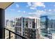 Amazing balcony view overlooking city buildings and blue skies at 1280 W Peachtree Street Nw, Unit #3414, Atlanta, GA 30309