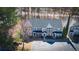 Aerial view of townhomes, parking, and tree coverage at 902 Tree Creek Blvd # 2, Lawrenceville, GA 30043