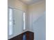 Inviting foyer featuring a bright white front door and hardwood flooring at 902 Tree Creek Blvd # 2, Lawrenceville, GA 30043