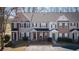 Attractive townhomes displaying coordinated facades, tidy landscaping, and convenient parking at 902 Tree Creek Blvd # 2, Lawrenceville, GA 30043