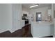 Modern kitchen featuring white cabinetry, countertops and stainless steel appliances at 902 Tree Creek Blvd # 2, Lawrenceville, GA 30043
