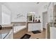 Light and bright bathroom showcasing double sinks, soaking tub, and a separate glass enclosed shower at 138 Lakestone Pkwy, Woodstock, GA 30188