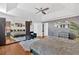 Spacious bedroom features a walk-in closet, hard wood floors, tray ceiling, and soothing color palette at 138 Lakestone Pkwy, Woodstock, GA 30188