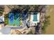 Aerial view highlighting tennis and swimming amenities in the community at 138 Lakestone Pkwy, Woodstock, GA 30188