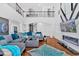 Bright living room with high ceilings, modern fireplace, and open floor plan, creating an inviting and stylish space at 138 Lakestone Pkwy, Woodstock, GA 30188