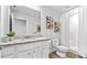Modern bathroom featuring a vanity with granite countertop and a walk-in shower at 654 Egrets Lndg, Covington, GA 30014