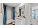 Bathroom featuring a single vanity and a shower with a tub at 654 Egrets Lndg, Covington, GA 30014