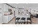 Modern kitchen featuring granite countertops, stainless steel appliances, eat in dining, and kitchen island at 654 Egrets Lndg, Covington, GA 30014