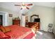 Comfortable bedroom with ample natural light, neutral colors, and a ceiling fan at 7865 Lake Ter, Douglasville, GA 30134