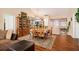 Open-concept dining area with hardwood floors and close to the open kitchen at 7865 Lake Ter, Douglasville, GA 30134