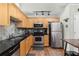 Contemporary kitchen with stainless steel appliances and light wood cabinets at 1026 Saint Charles Ne Ave # 10, Atlanta, GA 30306