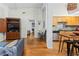 Open-concept living space with hardwood floors, and combined kitchen area at 1026 Saint Charles Ne Ave # 10, Atlanta, GA 30306