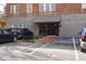 Convenient parking area with marked spaces and easy access to building entrance at 1026 Saint Charles Ne Ave # 10, Atlanta, GA 30306