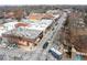 The shops and restaurants of the community with a well-trafficked street in front of the store fronts at 1026 Saint Charles Ne Ave # 10, Atlanta, GA 30306