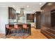 Spacious kitchen with dark cabinets, stainless steel appliances, and a breakfast bar at 1031 Lindridge Ne Dr, Atlanta, GA 30324