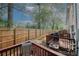 Fenced backyard with wooden deck offers a private and relaxing outdoor space at 1290 Adcox Sq, Stone Mountain, GA 30088