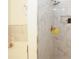 Bright bathroom boasts tiled shower with rain shower head and built-in niche at 1290 Adcox Sq, Stone Mountain, GA 30088
