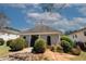 Community pool surrounded by lush landscaping, offering a relaxing retreat for residents at 1290 Adcox Sq, Stone Mountain, GA 30088