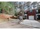 Attractive exterior featuring a well-manicured lawn and private driveway at 1290 Adcox Sq, Stone Mountain, GA 30088