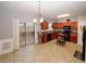 Kitchen with wood cabinets, a microwave, and a view of the deck at 1290 Adcox Sq, Stone Mountain, GA 30088
