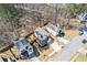 Overhead shot of a neighborhood featuring single Gathering homes with nicely manicured lawns at 851 Ashley Ln, Stone Mountain, GA 30087