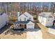 Charming two-story home boasts a welcoming front porch and attached one-car garage at 851 Ashley Ln, Stone Mountain, GA 30087