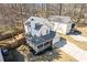 Birds-eye view of a two-story home featuring a welcoming front porch and attached one-car garage at 851 Ashley Ln, Stone Mountain, GA 30087