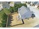 Aerial view showcasing the home's fenced backyard with a pergola, offering privacy and an inviting outdoor space at 1039 Bramble Way, Grayson, GA 30017