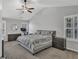 Bright bedroom with vaulted ceiling, comfortable bed, and modern furnishings at 1039 Bramble Way, Grayson, GA 30017