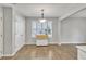 Dining area features natural light, wood floors, and neutral paint; perfect for gatherings at 1039 Bramble Way, Grayson, GA 30017