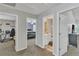 Upstairs hallway showing doorways to bedroom, bathroom, and a study room at 1039 Bramble Way, Grayson, GA 30017