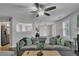 Cozy living room with a large sectional, fireplace, and open layout; perfect for entertaining at 1039 Bramble Way, Grayson, GA 30017
