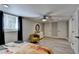 Spacious bedroom with a large window and minimalist decor at 2945 Monterey Dr, Decatur, GA 30032