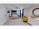 Bedroom featuring a modern ceiling fan and ample lighting with an ensuite bathroom at 2945 Monterey Dr, Decatur, GA 30032
