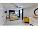 Stylish bedroom with light wood floors, a ceiling fan, and a modern color palette at 2945 Monterey Dr, Decatur, GA 30032