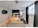 Cozy bedroom with natural light, a modern aesthetic and a wall-mounted TV at 2945 Monterey Dr, Decatur, GA 30032