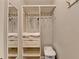 A functional walk-in closet featuring multiple shelves and custom organizers at 2945 Monterey Dr, Decatur, GA 30032