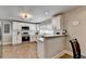 Charming kitchen boasts stainless steel appliances, white cabinets, and hardwood floors, providing a warm space at 2945 Monterey Dr, Decatur, GA 30032
