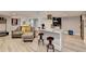 The kitchen has an island with stool seating, an adjoining living space, and updated finishes at 2945 Monterey Dr, Decatur, GA 30032