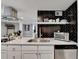 Well-equipped kitchen with stylish black splash, perfect for cooking and entertaining guests at 2945 Monterey Dr, Decatur, GA 30032