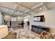 Living room with coffered ceilings, a comfortable gray sofa, and an adjacent dining area at 2945 Monterey Dr, Decatur, GA 30032