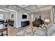 A living room with an open floorplan showcases a sectional sofa and hardwood flooring at 2945 Monterey Dr, Decatur, GA 30032