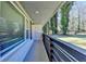 Front porch features a modern railing, a brick exterior, and a green lawn at 2945 Monterey Dr, Decatur, GA 30032