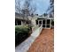 Charming front entrance with a wooden ramp and cozy screened porch at 4341 Kings Ne Way, Marietta, GA 30067