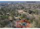 Aerial view of a home nestled among trees, close to Canton Street at 1300 Valley Ct, Roswell, GA 30075