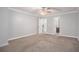 Spacious bedroom with neutral walls, carpet, and ensuite bathroom at 1083 Lake Dr, Snellville, GA 30039